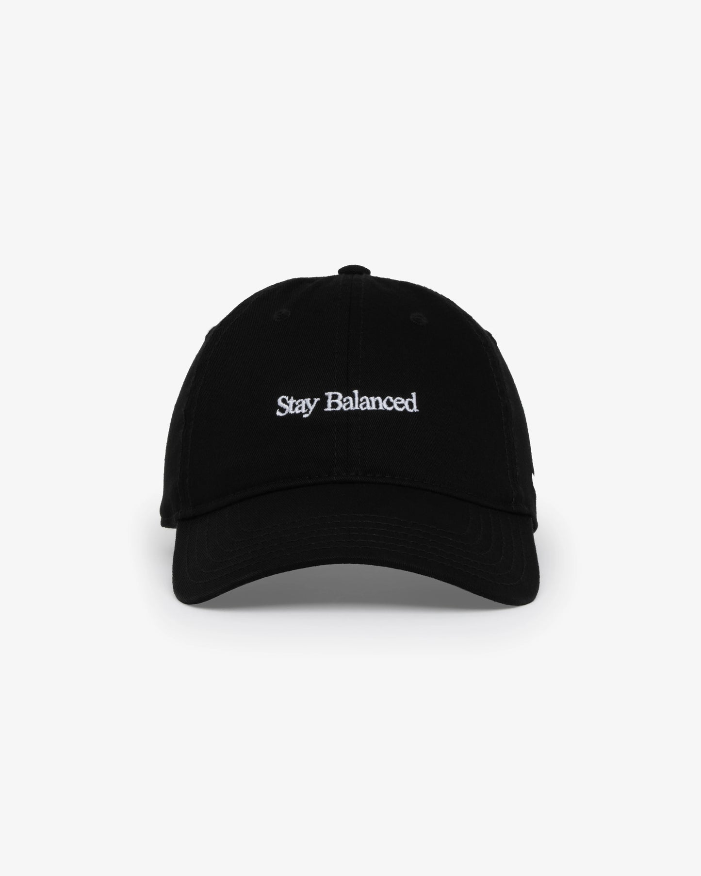 Van Libra Blackwood (black) dad hat with white embroidered text “Stay Balanced” on the front, “1986” stitched on the side, and “VAN LIBRA” on the back above an adjustable strap with brass buckle.