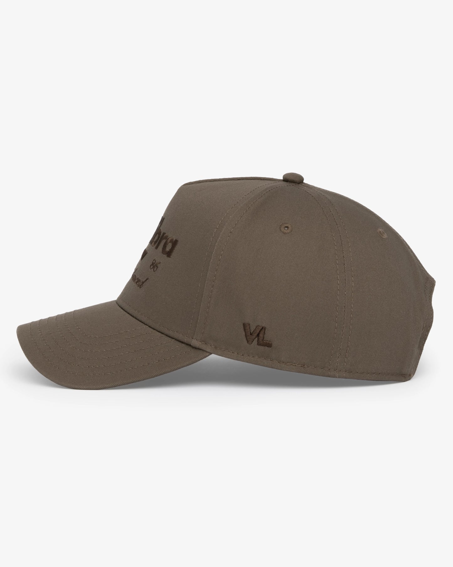 Van Libra Umber (brown) structured cap with umber colored crown and brim. Features brown embroidered text “van libra” with abstract triangle graphic on the front, “1986” and “Stay Balanced” lettering on the front, plus “VL” stitched on the side, finished with an adjustable umber snapback closure at the back.