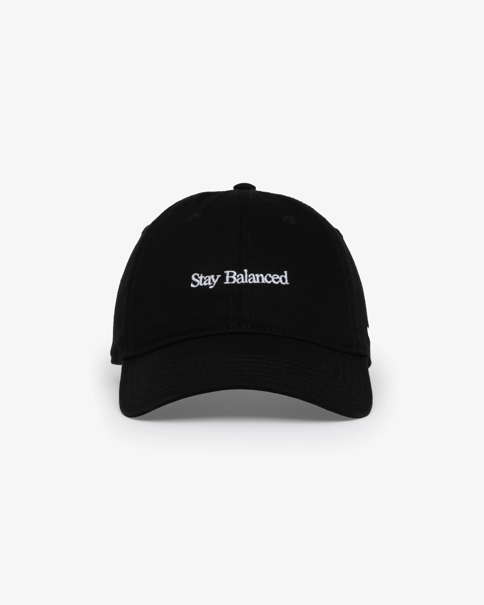 Van Libra Blackwood (black) dad hat with white embroidered text “Stay Balanced” on the front, “1986” stitched on the side, and “VAN LIBRA” on the back above an adjustable strap with brass buckle.