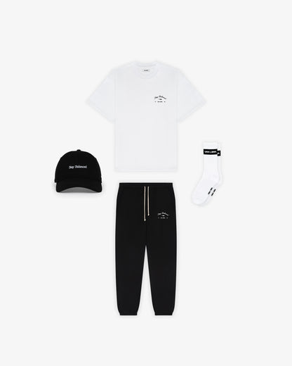 Van Libra Blackwood (black) dad hat with white embroidered text “Stay Balanced” on the front, “1986” stitched on the side, and “VAN LIBRA” on the back above an adjustable strap with brass buckle.
