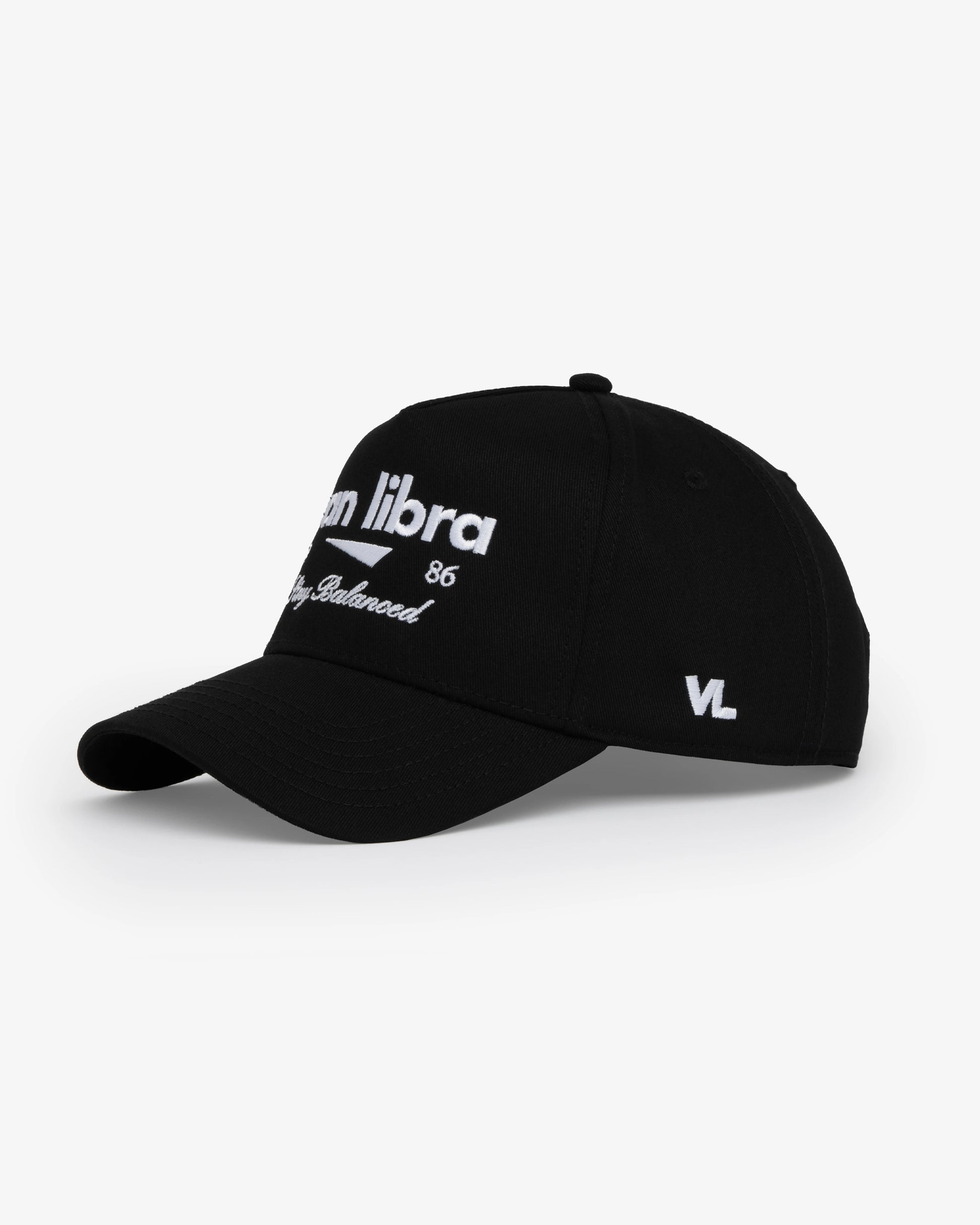 Van Libra Blackwood (black) structured cap with blackwood colored crown and brim. Features white embroidered text “van libra” with abstract triangle graphic on the front, “1986” and “Stay Balanced” lettering on the front, plus “VL” stitched on the side, finished with an adjustable blackwood snapback closure at the back.