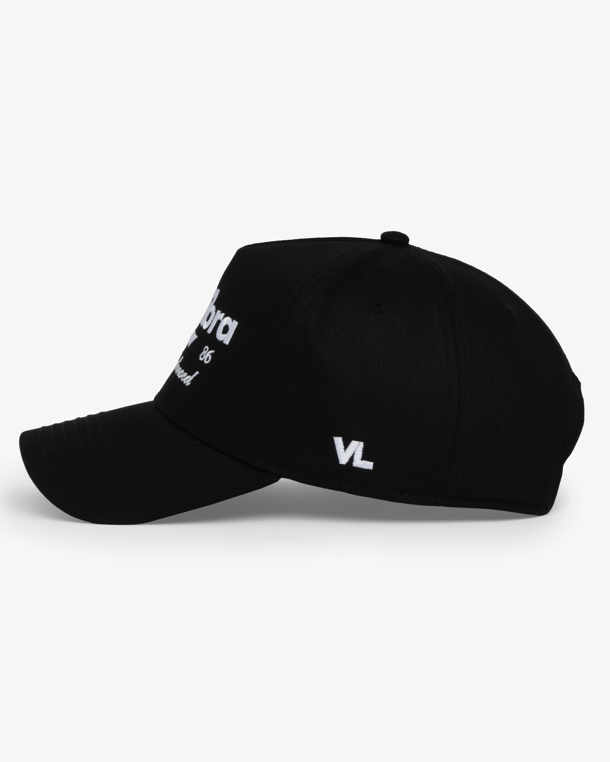 Van Libra Blackwood (black) structured cap with blackwood colored crown and brim. Features white embroidered text “van libra” with abstract triangle graphic on the front, “1986” and “Stay Balanced” lettering on the front, plus “VL” stitched on the side, finished with an adjustable blackwood snapback closure at the back.