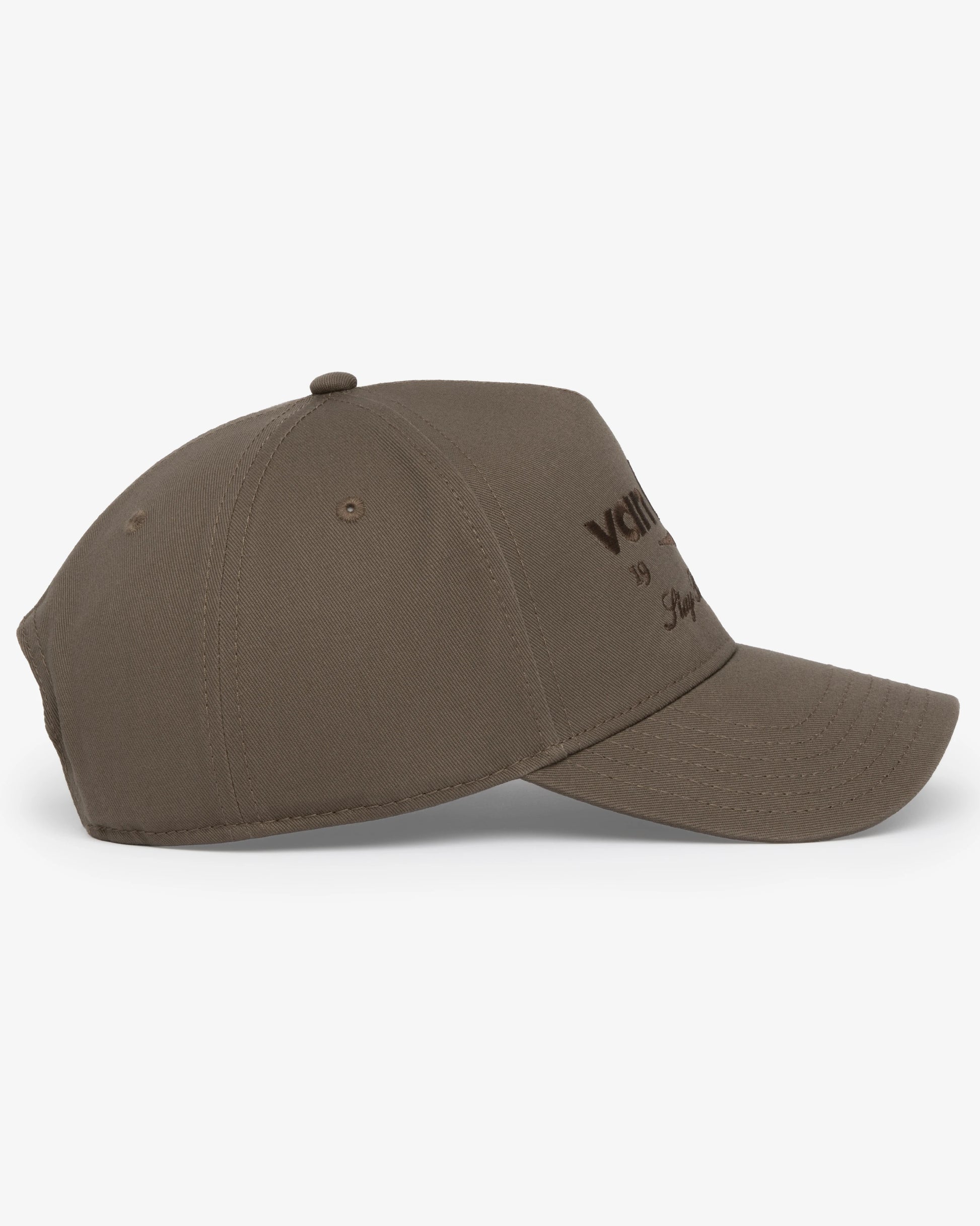 Van Libra Umber (brown) structured cap with umber colored crown and brim. Features brown embroidered text “van libra” with abstract triangle graphic on the front, “1986” and “Stay Balanced” lettering on the front, plus “VL” stitched on the side, finished with an adjustable umber snapback closure at the back.