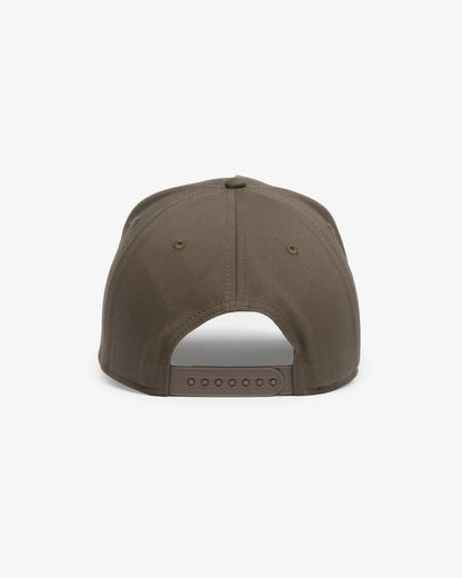 Van Libra Umber (brown) structured cap with umber colored crown and brim. Features brown embroidered text “van libra” with abstract triangle graphic on the front, “1986” and “Stay Balanced” lettering on the front, plus “VL” stitched on the side, finished with an adjustable umber snapback closure at the back.